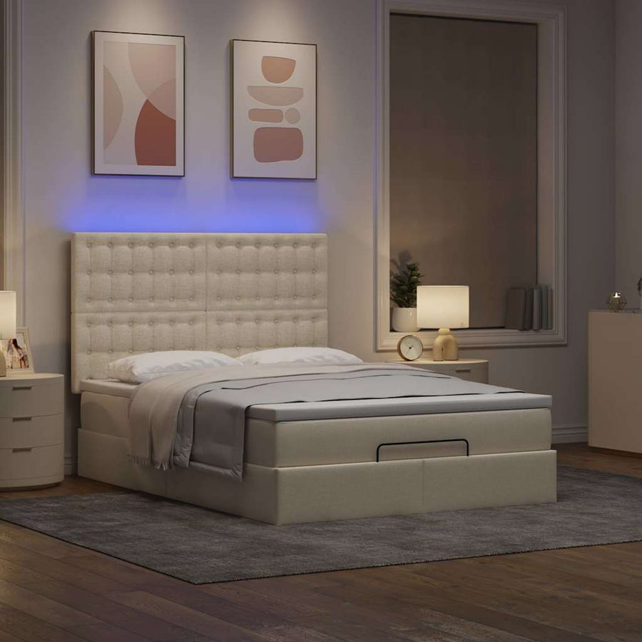 Ottoman bed met matras en LED's 140x190cm stof crèmekleurig