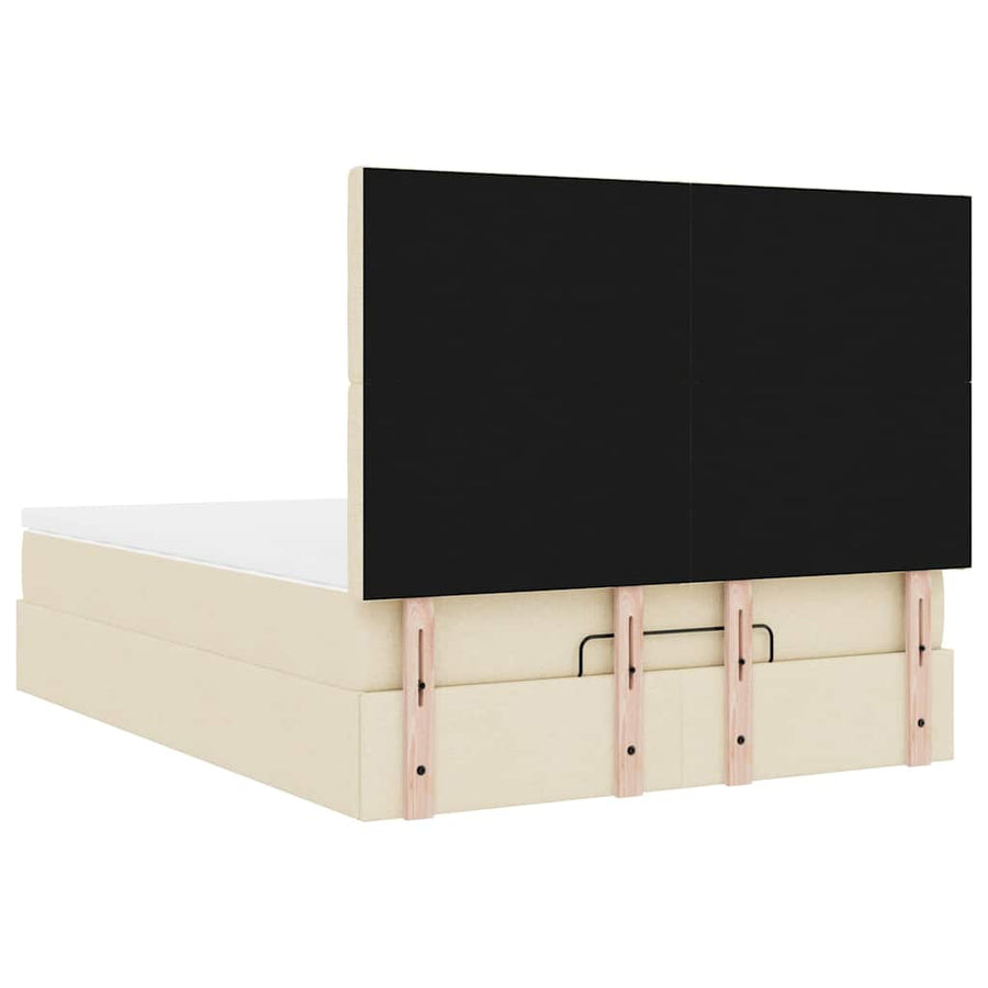 Ottoman bed met matras en LED's 140x190cm stof crèmekleurig