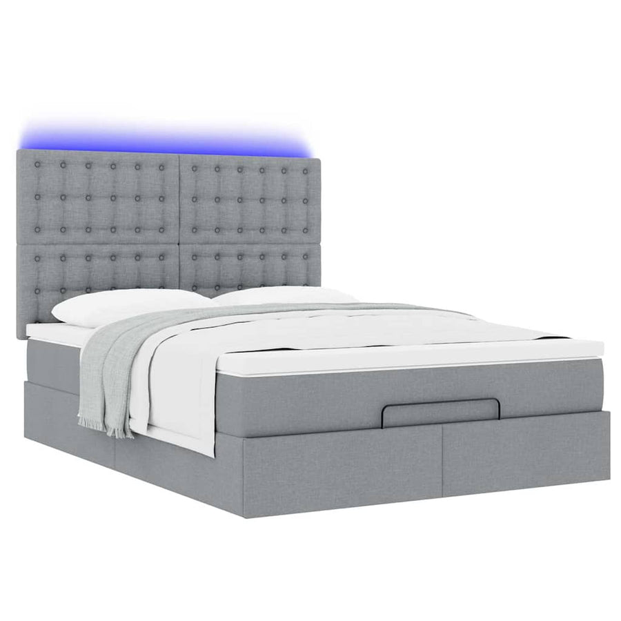 Ottoman bed met matras en LED's 140x200cm stof lichtgrijs