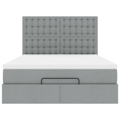 Ottoman bed met matras en LED's 140x200cm stof lichtgrijs
