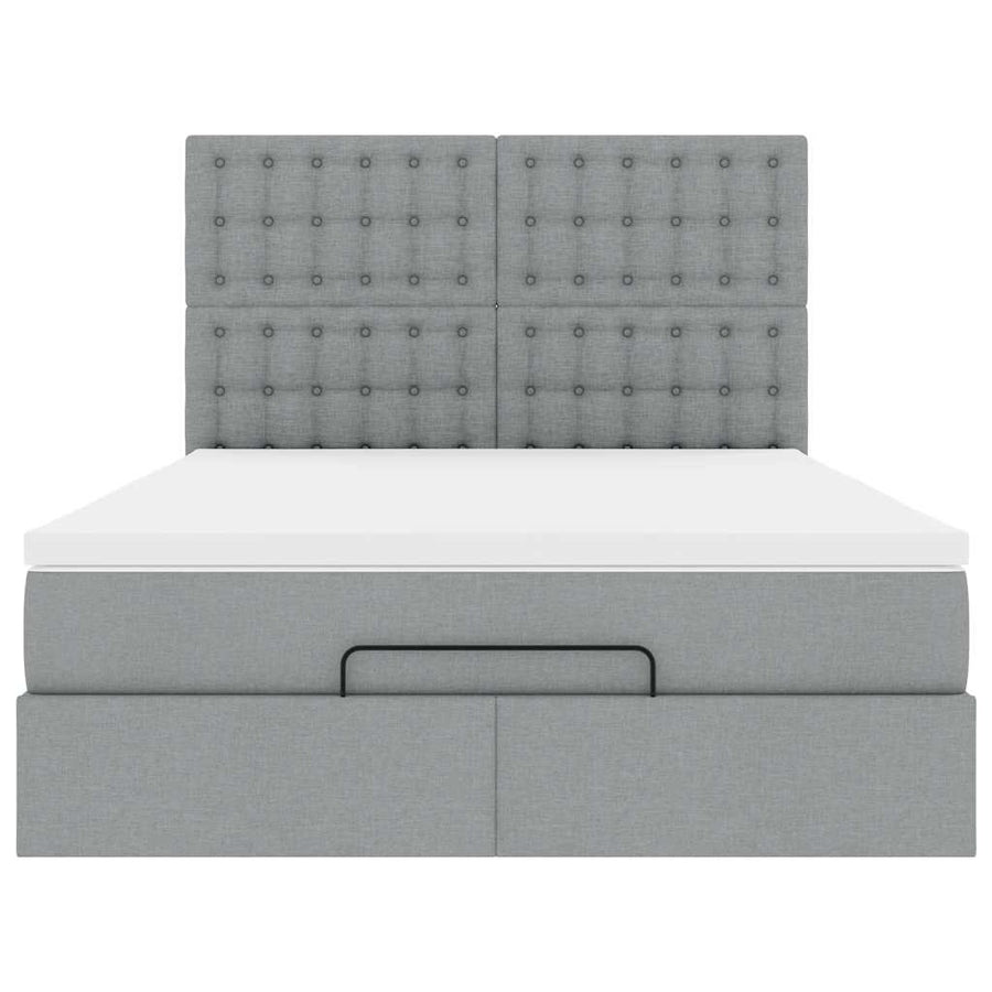 Ottoman bed met matras en LED's 140x200cm stof lichtgrijs