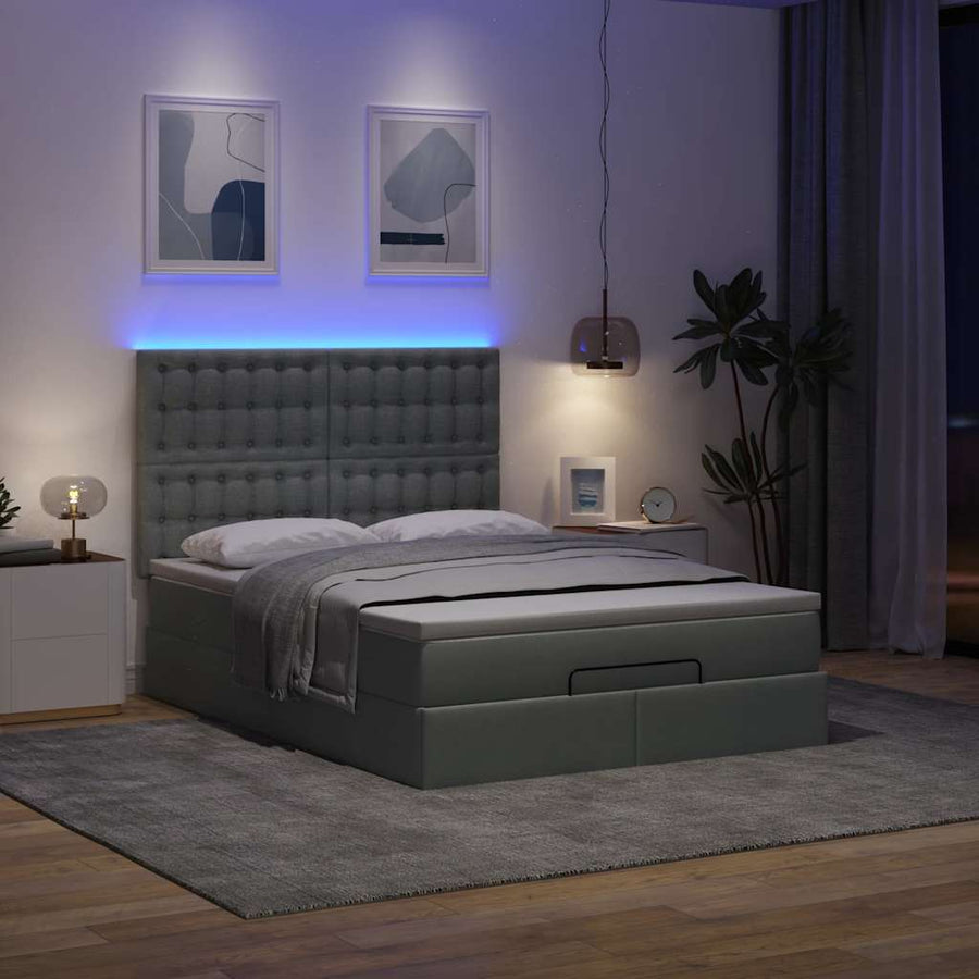 Ottoman bed met matras en LED's 140x200cm stof donkergrijs