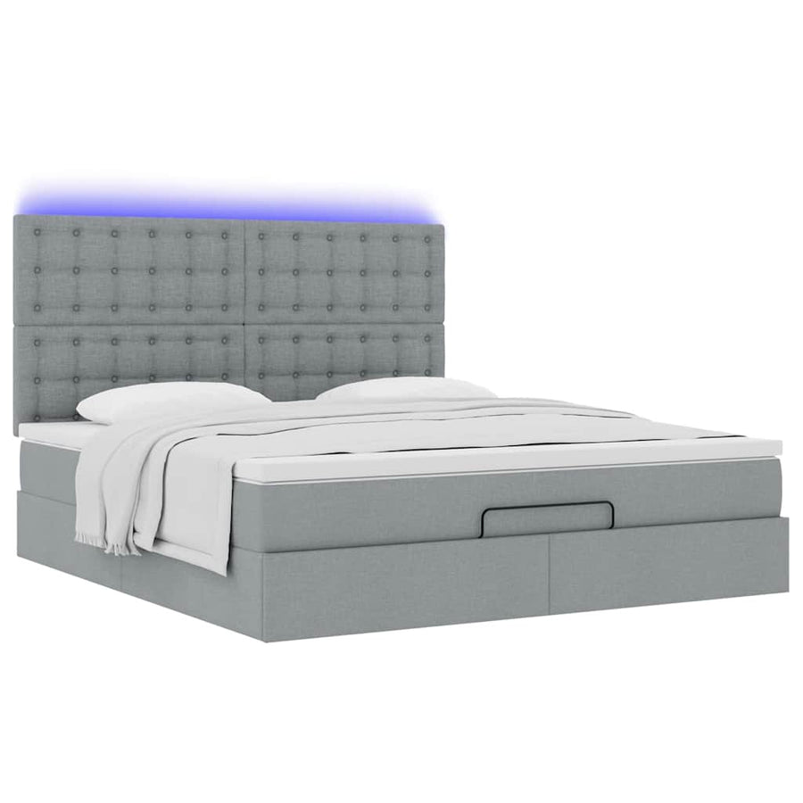 Ottoman bed met matras en LED's 180x200cm stof lichtgrijs