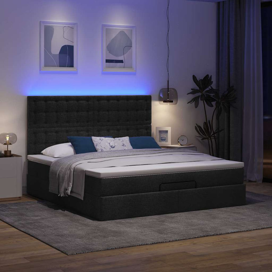 Ottoman bed met matras en LED's 180x200cm stof zwart