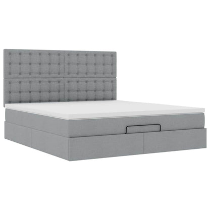 Ottoman bed met matras en LED's 180x200cm stof taupe