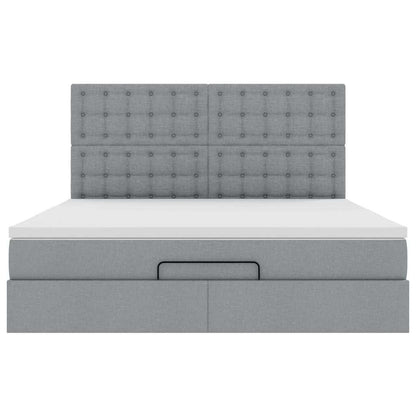 Ottoman bed met matras en LED's 180x200cm stof taupe