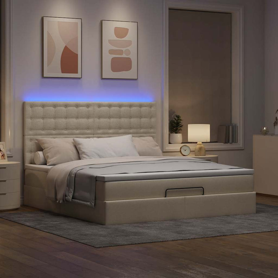 Ottoman bed met matras en LED's 180x200cm stof crèmekleurig