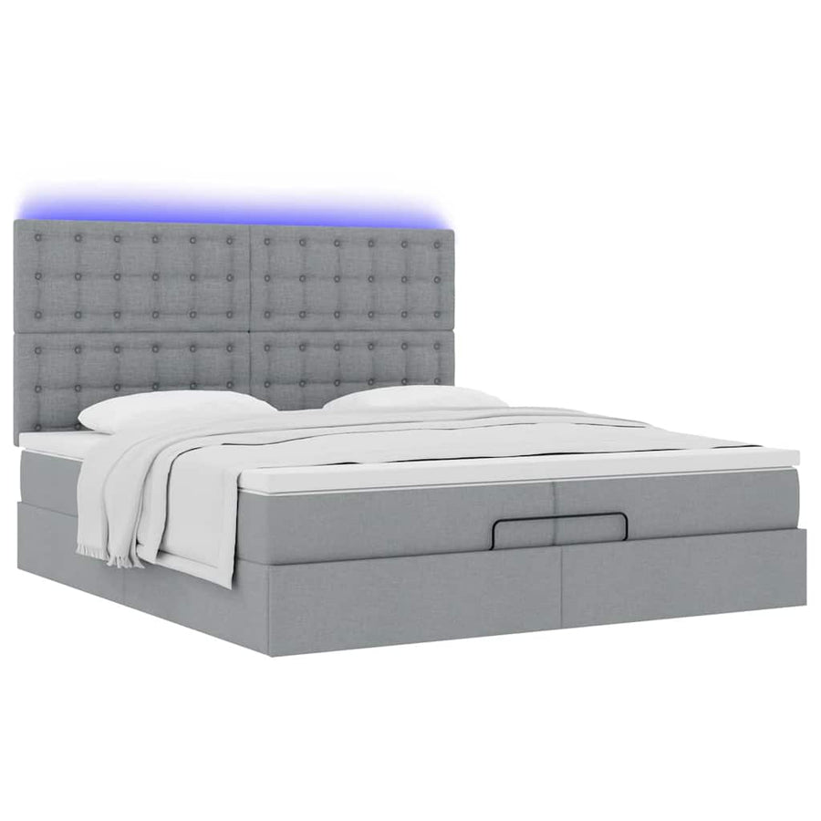 Ottoman bed met matrassen en LED's 200x200cm stof lichtgrijs