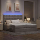 Ottoman bed 200x200 cm stof taupe met opbergruimte en LED