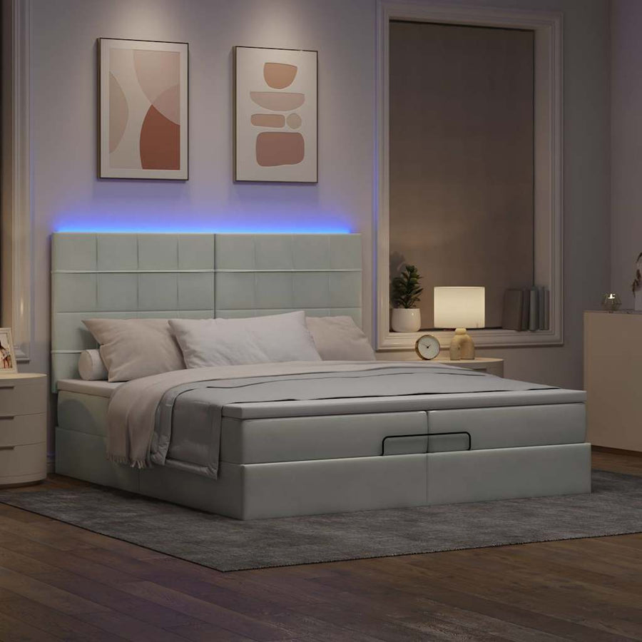 Ottoman bed met matrassen en LED's 200x200cm fluweel lichtgrijs