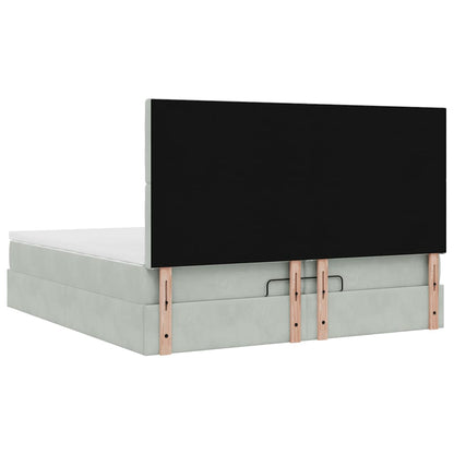 Ottoman bed met matrassen en LED's 200x200cm fluweel lichtgrijs