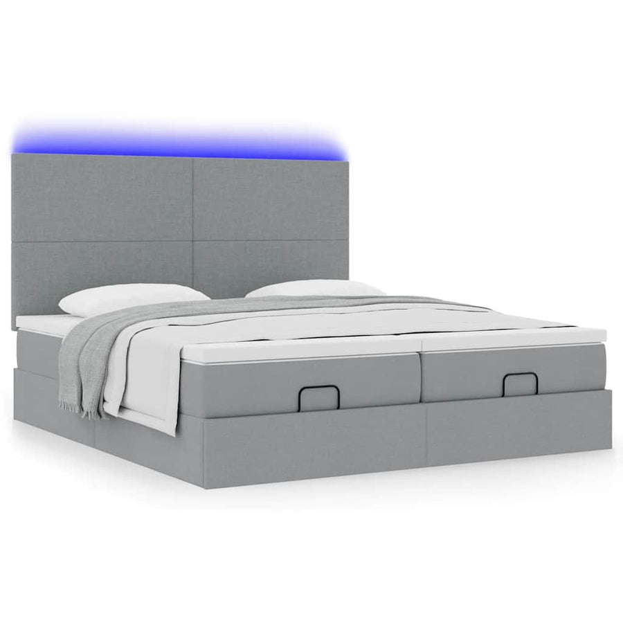 Ottoman bed met matrassen en LED's 160x200cm stof lichtgrijs