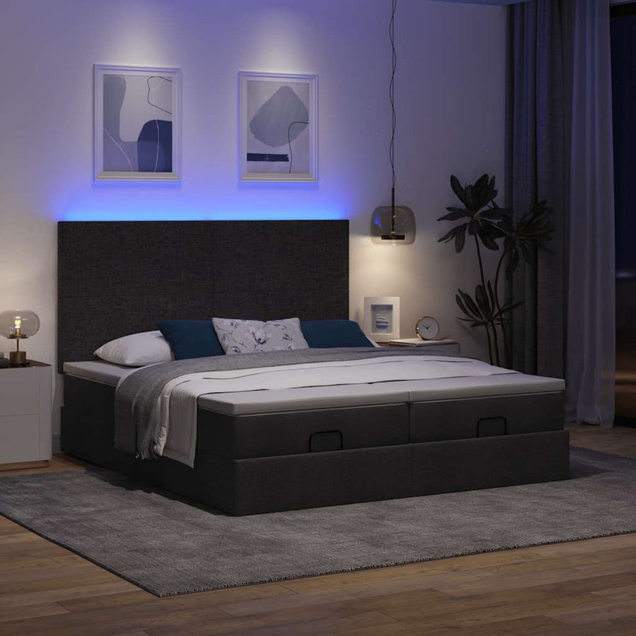 Ottoman bed met matrassen en LED's 160x200cm stof zwart