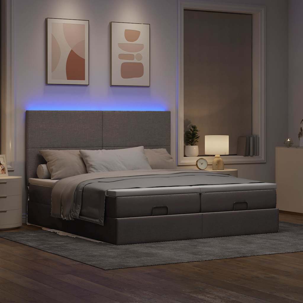 Ottoman bed met matrassen en LED's 160x200cm stof taupe