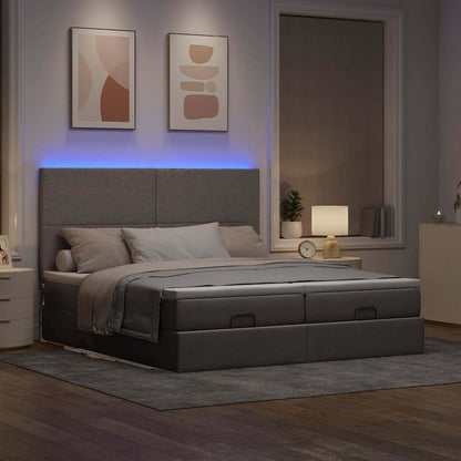 Ottoman bed met matrassen en LED's 160x200cm stof taupe