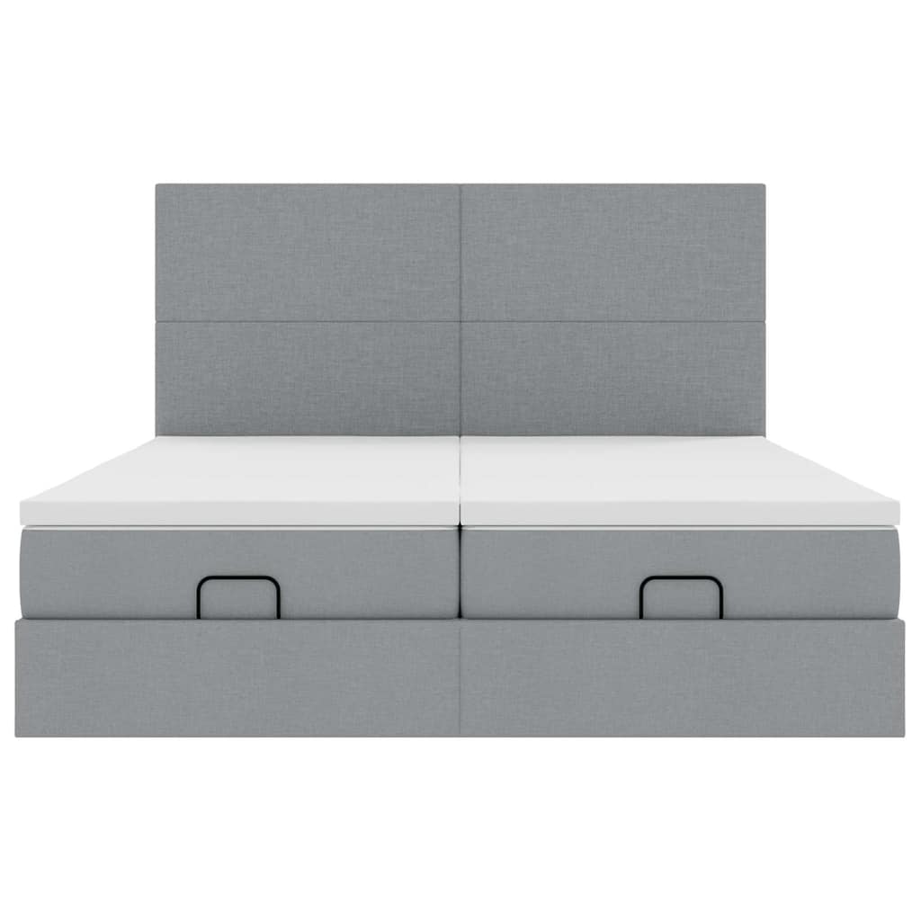 Ottoman bed met matrassen en LED's 180x200cm stof lichtgrijs