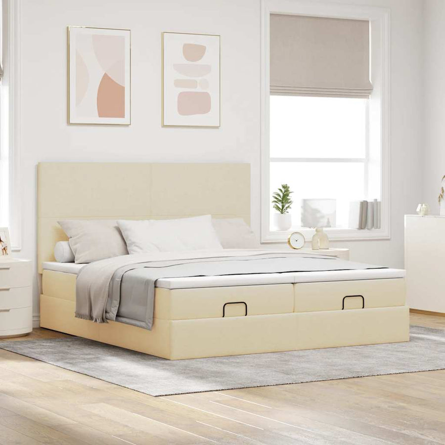 Ottoman bed met matrassen en LED's 180x200cm stof crèmekleurig