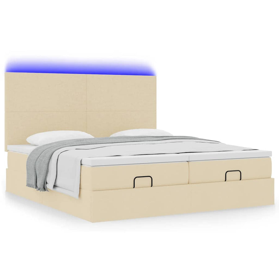 Ottoman bed met matrassen en LED's 180x200cm stof crèmekleurig