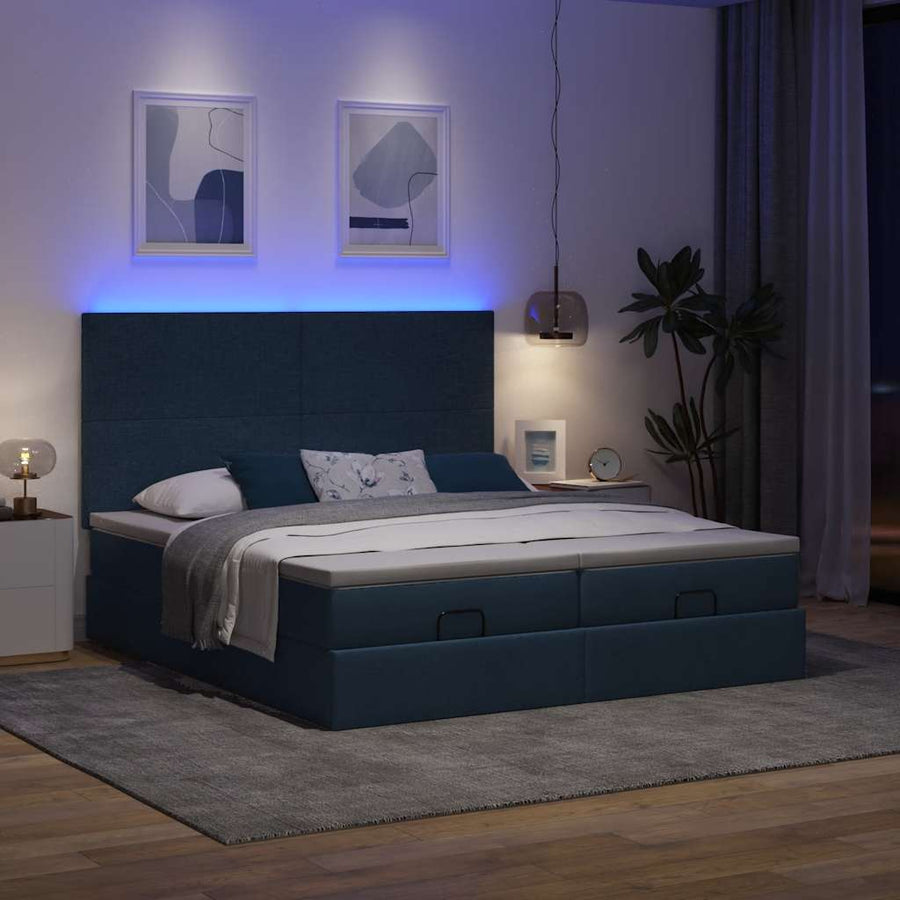 Ottoman bed met matrassen en LED's 180x200cm stof blauw