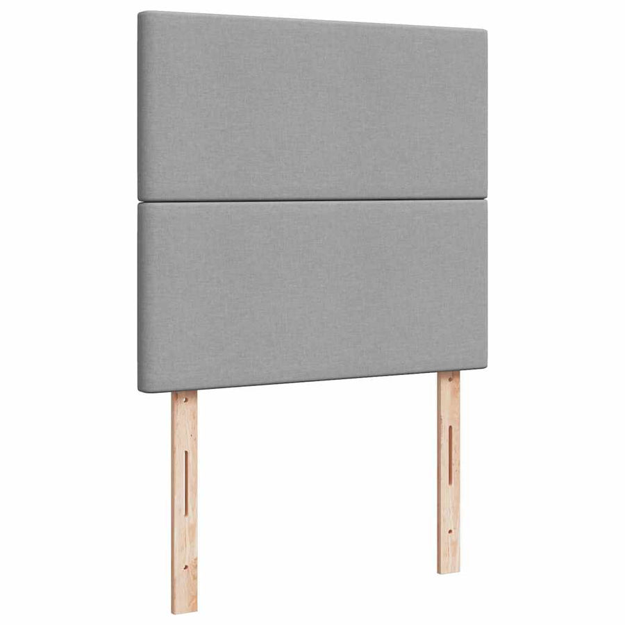 Ottoman bed met matrassen en LED's 200x200cm stof lichtgrijs