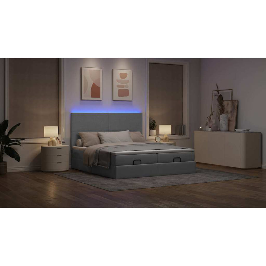 Ottoman bed met matrassen en LED's 200x200cm stof lichtgrijs