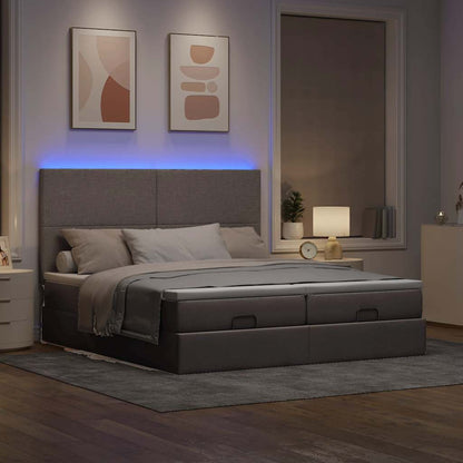 Ottoman bed met matrassen en LED's 200x200cm stof taupe