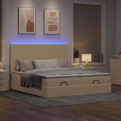 Ottoman bed met matrassen en LED's 200x200cm stof crèmekleurig