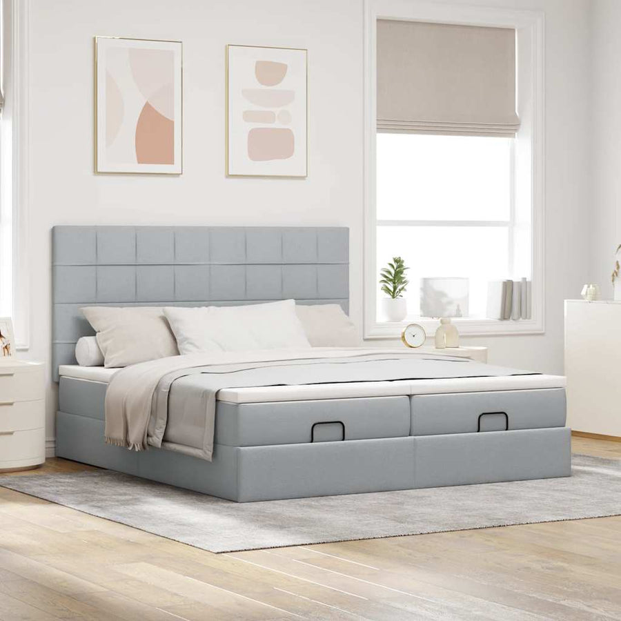 Ottoman bed met matrassen en LED's 160x200cm stof lichtgrijs