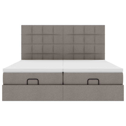 Ottoman bed met matrassen en LED's 160x200cm stof taupe