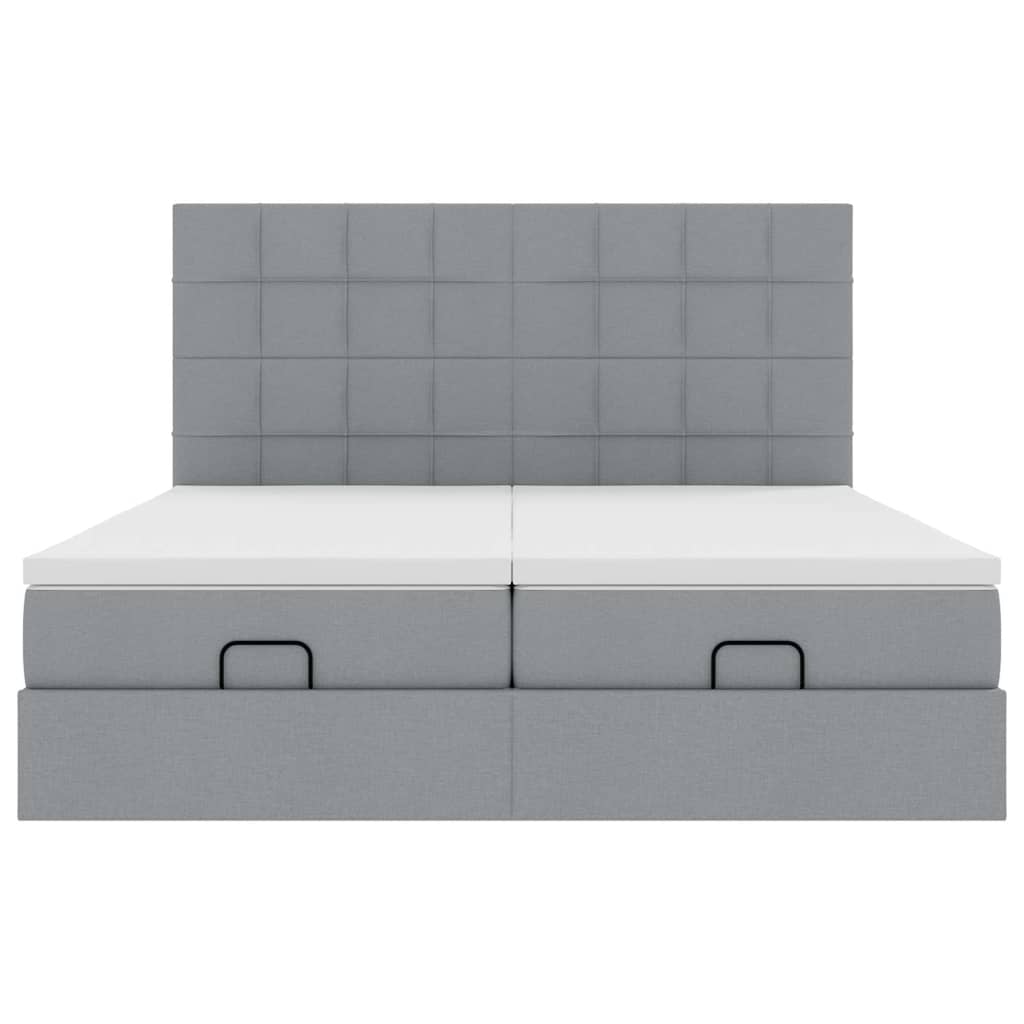 Ottoman bed met matrassen en LED's 180x200cm stof lichtgrijs