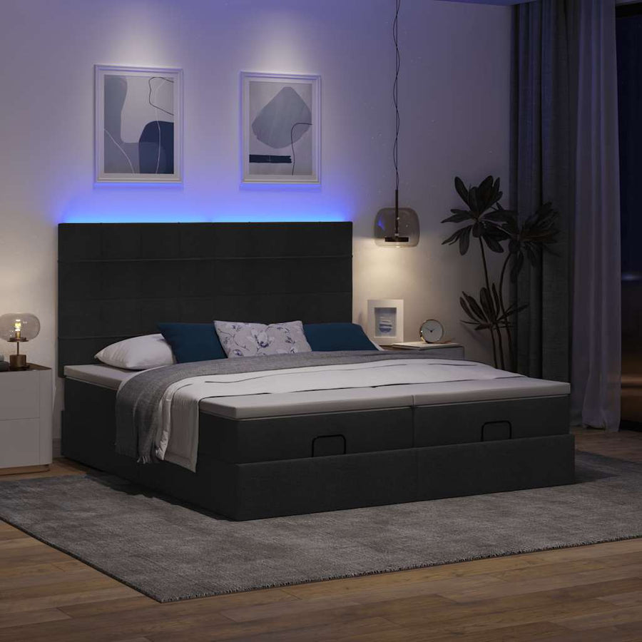 Ottoman bed met matrassen en LED's 180x200cm stof zwart