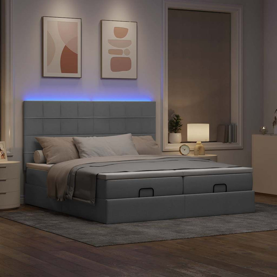 Ottoman bed met matrassen en LED's 200x200cm stof lichtgrijs