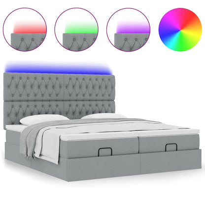 Ottoman bed met matrassen en LED's 180x200cm stof lichtgrijs