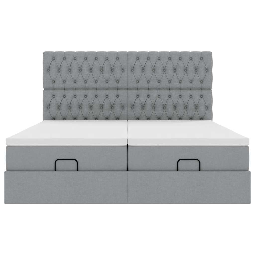 Ottoman bed met matrassen en LED's 180x200cm stof lichtgrijs