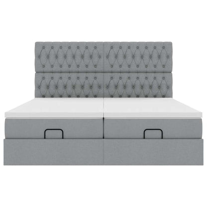 Ottoman bed met matrassen en LED's 180x200cm stof lichtgrijs