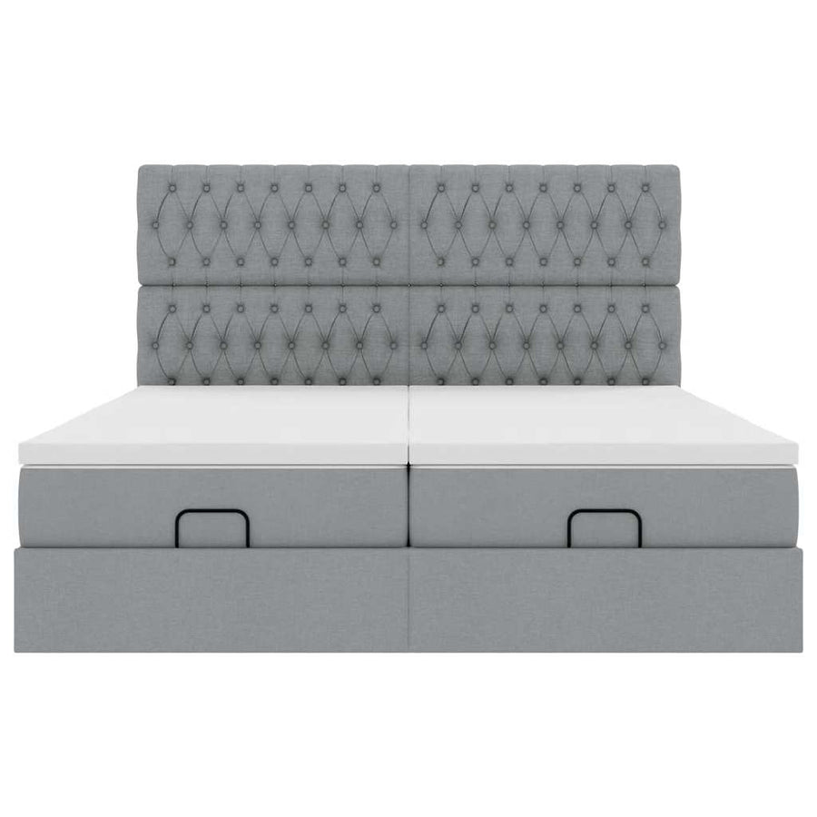 Ottoman bed met matrassen en LED's 180x200cm stof lichtgrijs