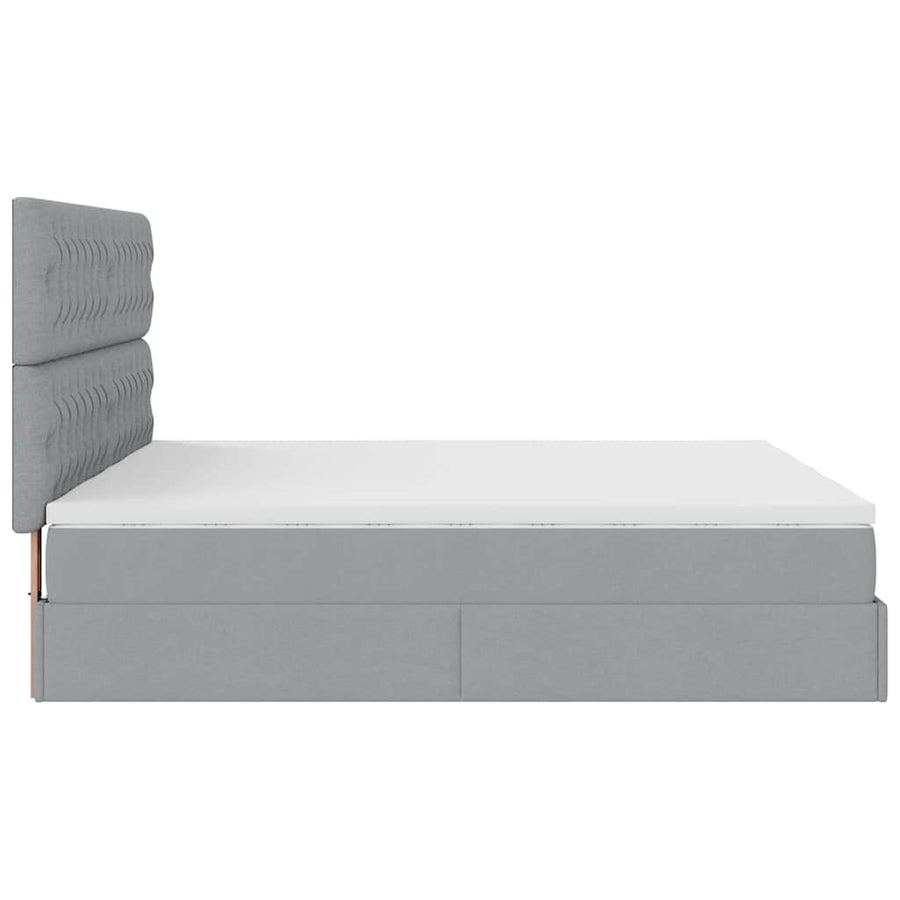 Ottoman bed met matrassen en LED's 180x200cm stof lichtgrijs