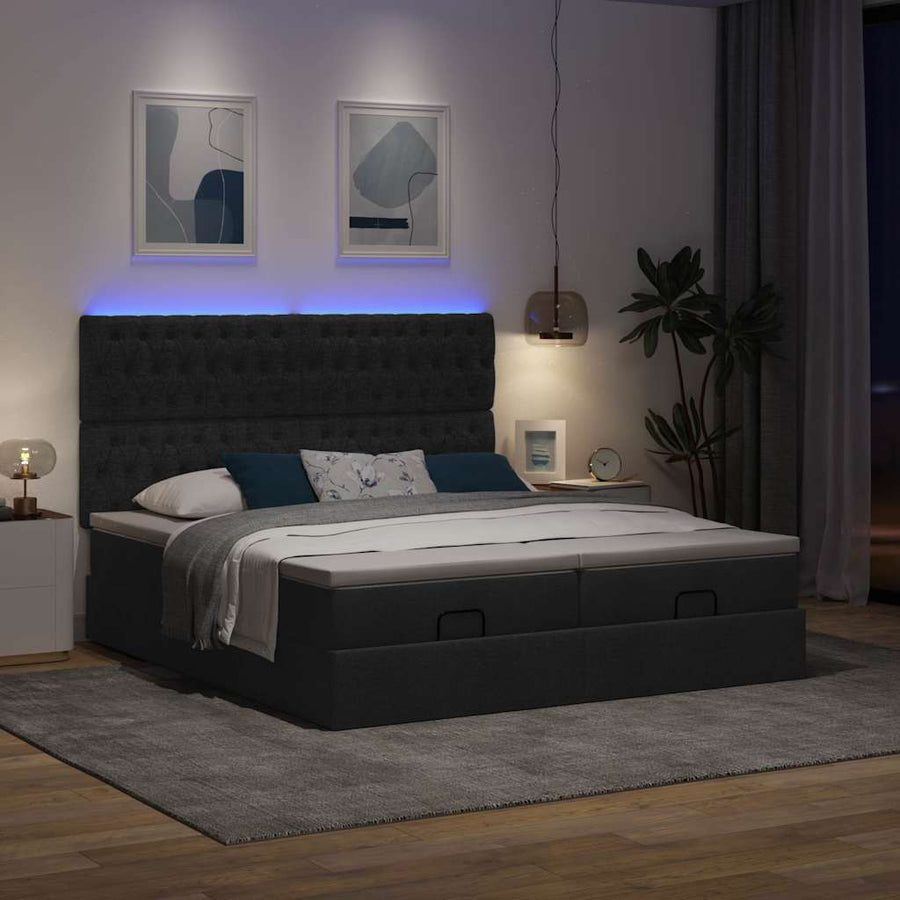 Ottoman bed met matrassen en LED's 180x200cm stof zwart