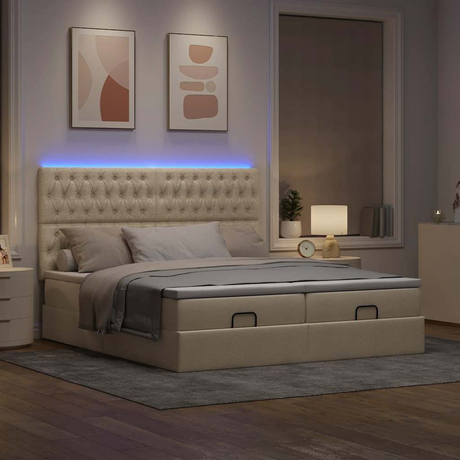 Ottoman bed met matrassen en LED's 180x200cm stof crèmekleurig
