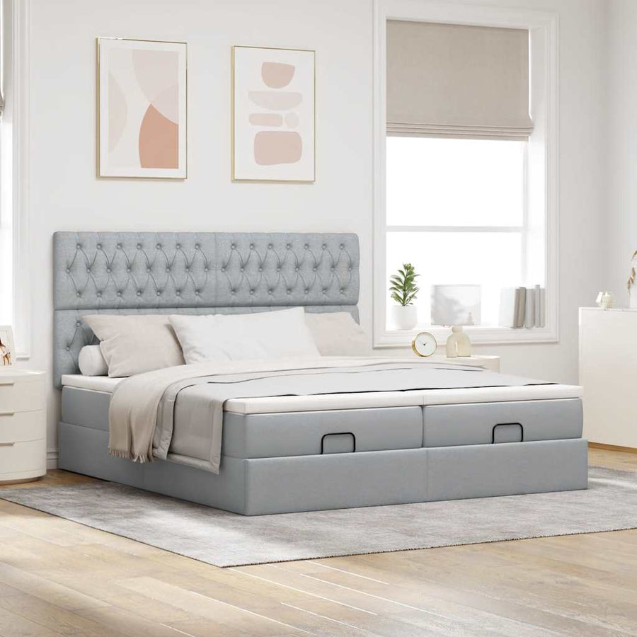 Ottoman bed met matrassen en LED's 200x200cm stof lichtgrijs