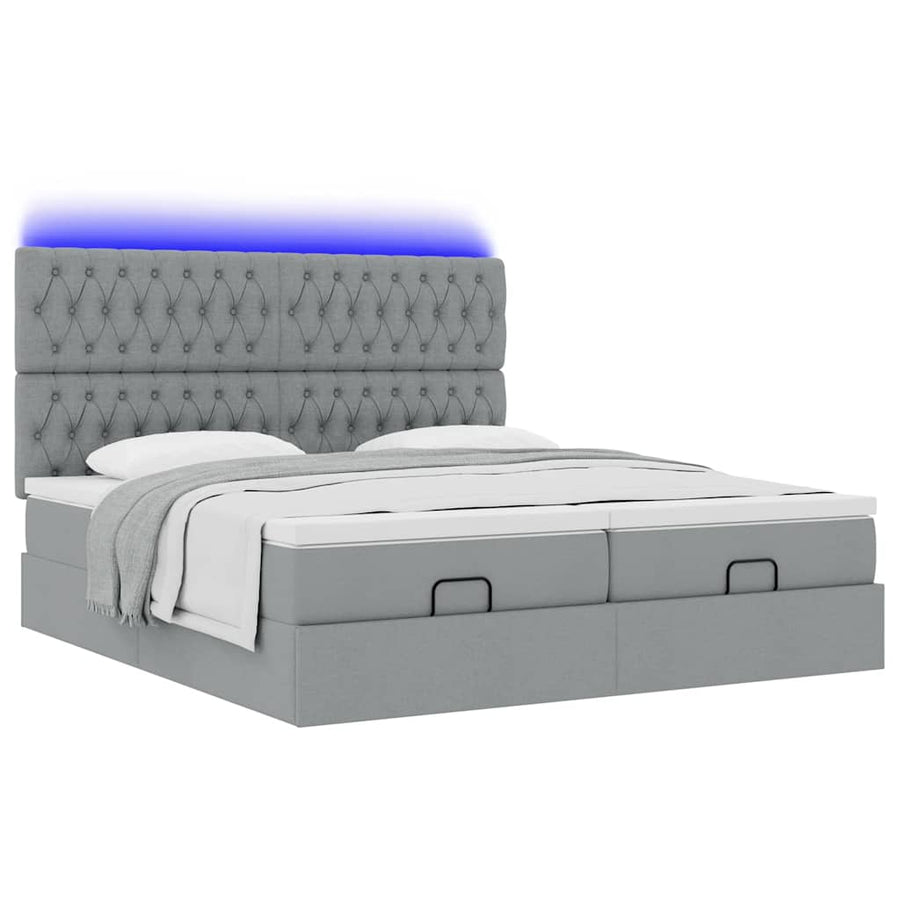 Ottoman bed met matrassen en LED's 200x200cm stof lichtgrijs