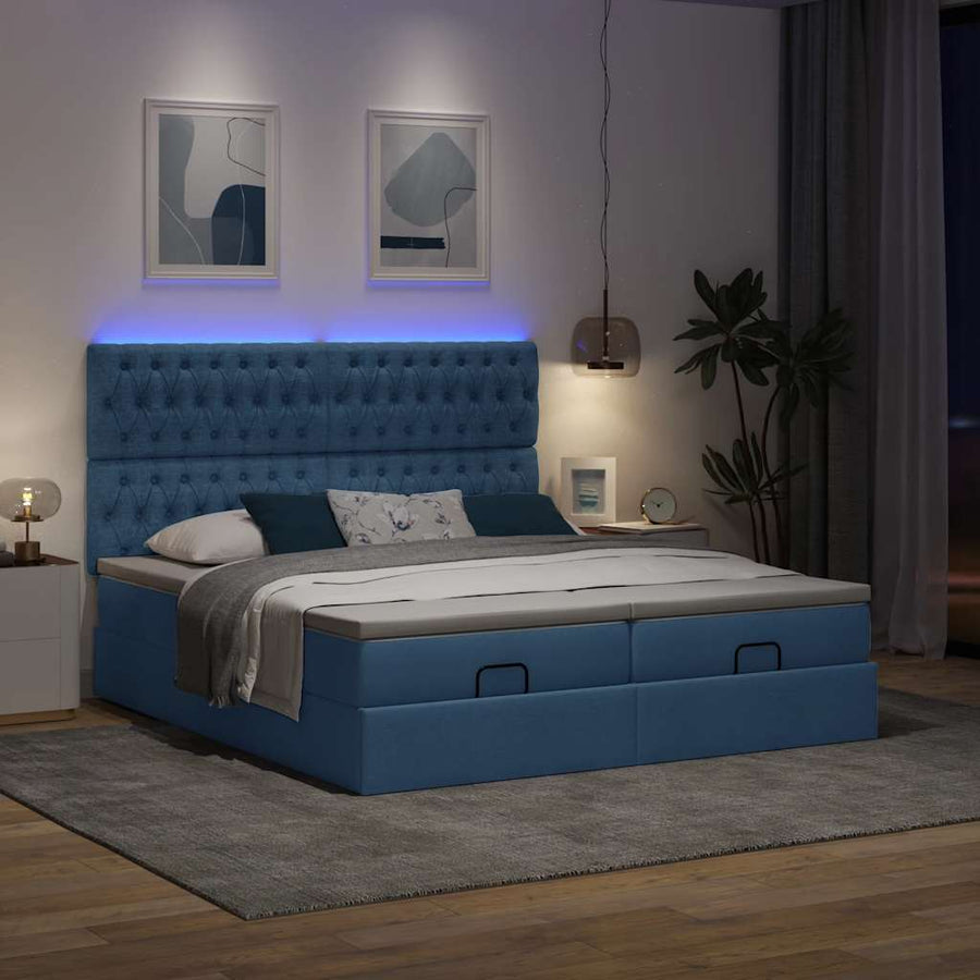 Ottoman bed met matrassen en LED's 200x200cm stof blauw