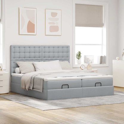 Ottoman bed met matrassen en LED's 160x200cm stof lichtgrijs