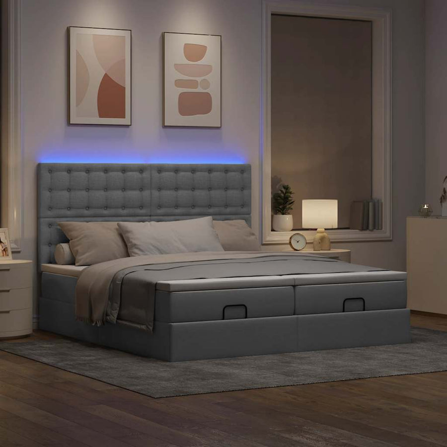Ottoman bed met matrassen en LED's 160x200cm stof lichtgrijs