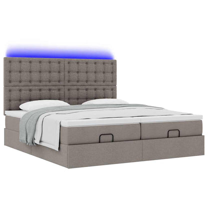 Ottoman bed met matrassen en LED's 160x200cm stof taupe