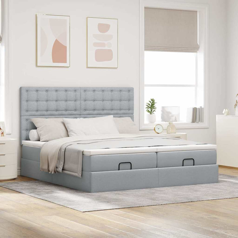 Ottoman bed met matrassen en LED's 180x200cm stof lichtgrijs