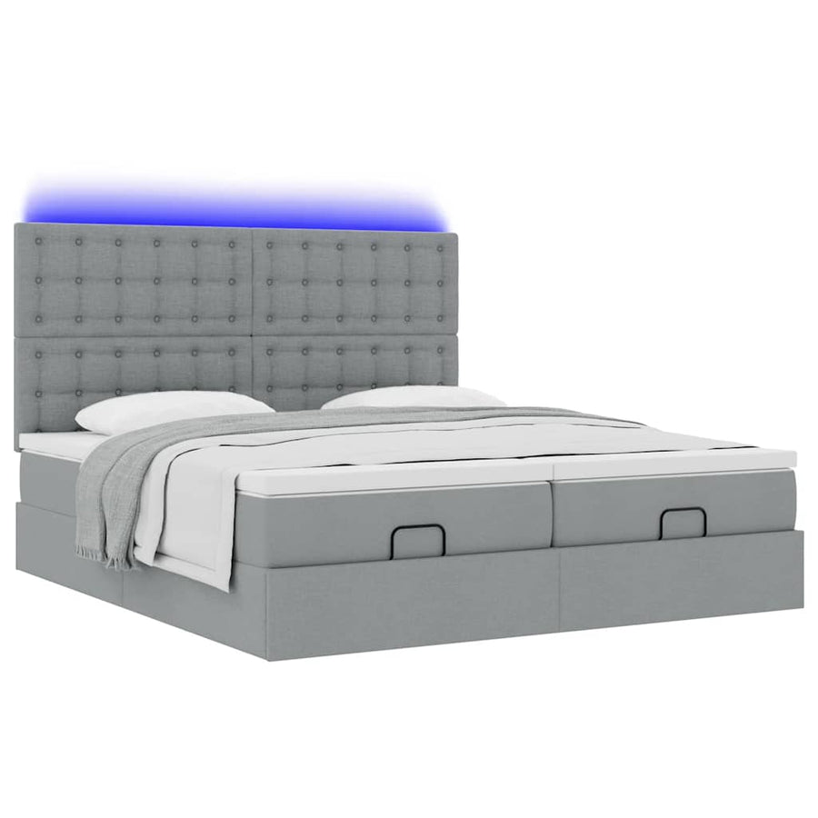 Ottoman bed met matrassen en LED's 180x200cm stof lichtgrijs