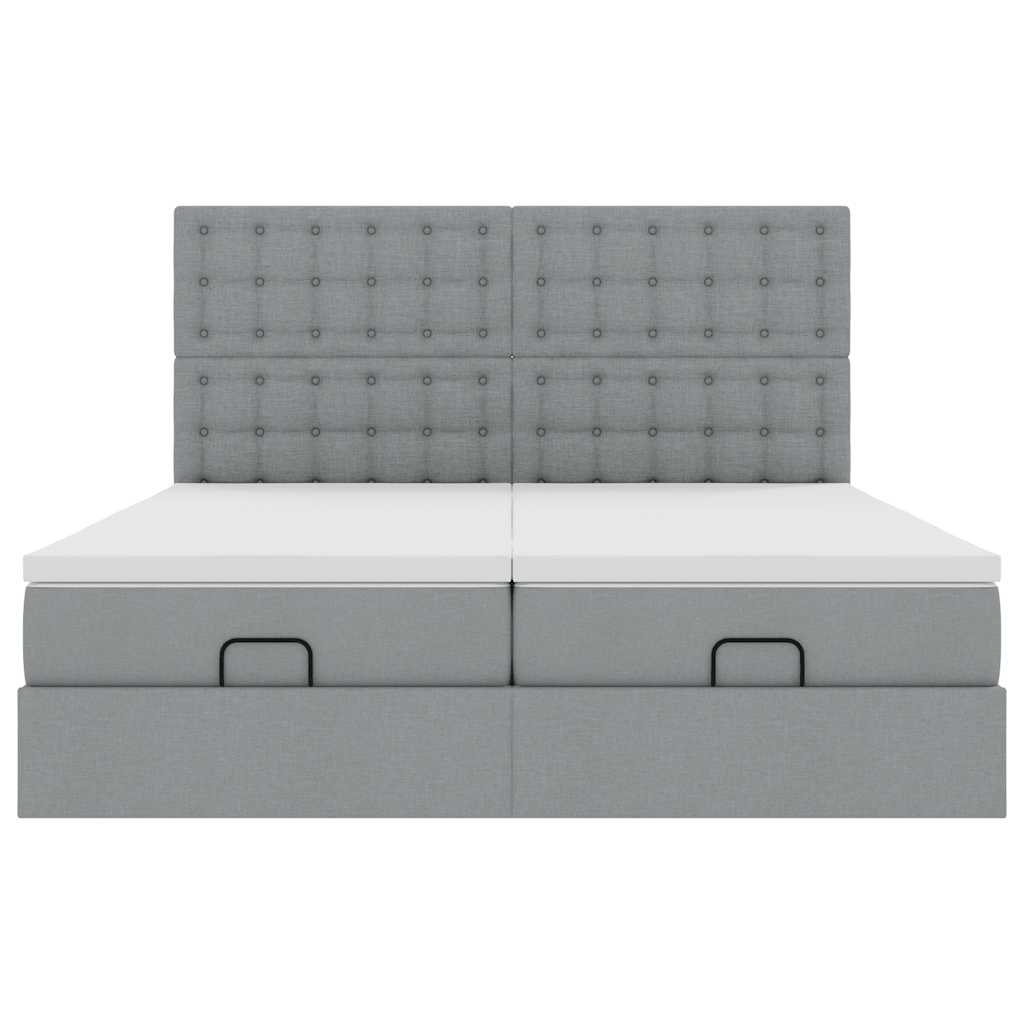 Ottoman bed met matrassen en LED's 180x200cm stof lichtgrijs