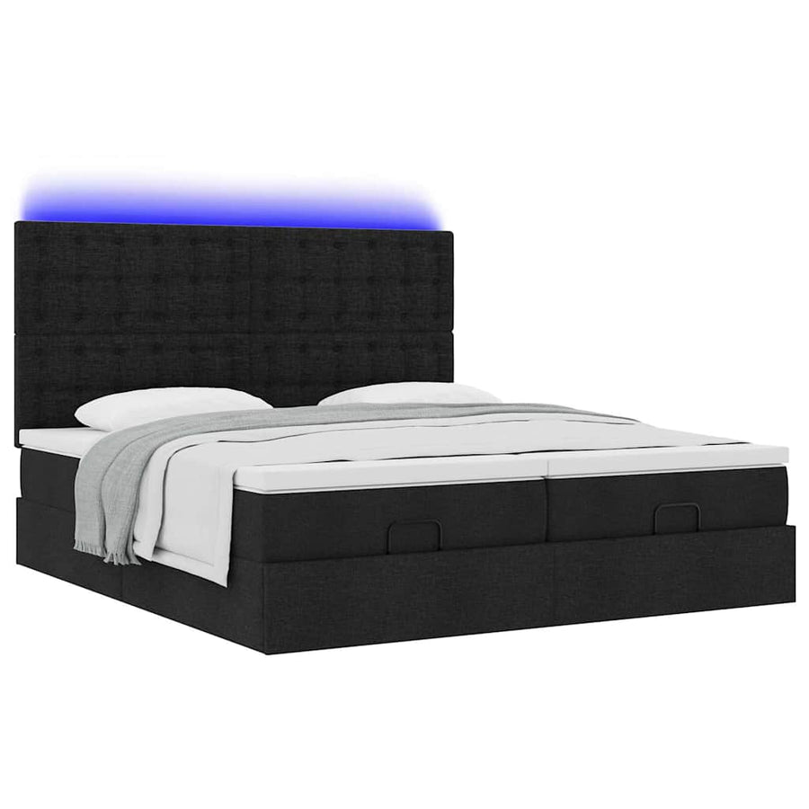 Ottoman bed met matrassen en LED's 180x200cm stof zwart