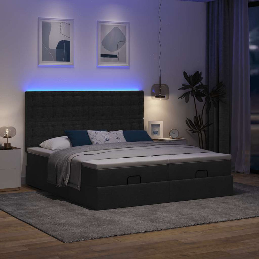Ottoman bed met matrassen en LED's 180x200cm stof zwart